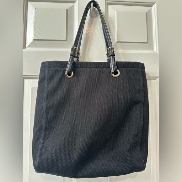 Michael Kors Handbags - Michael Kors Black and Gold Tote Bag with Structured Design